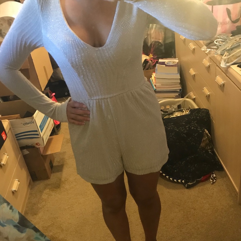 Sparkly beige romper.